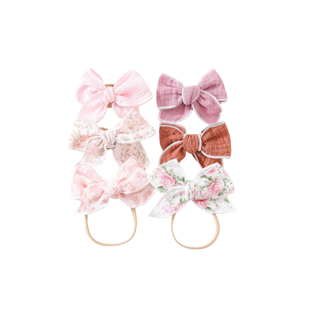 Rose Garden muslin baby bow headband 6-pack in rosy pinks, soft reds and white florals