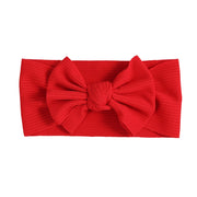 A red baby bow knot headband.
