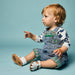 Little Boy In Blue Overalls Wearing Sommerfugl Kids Baby Leather Toddler Sandals Closed Toe White